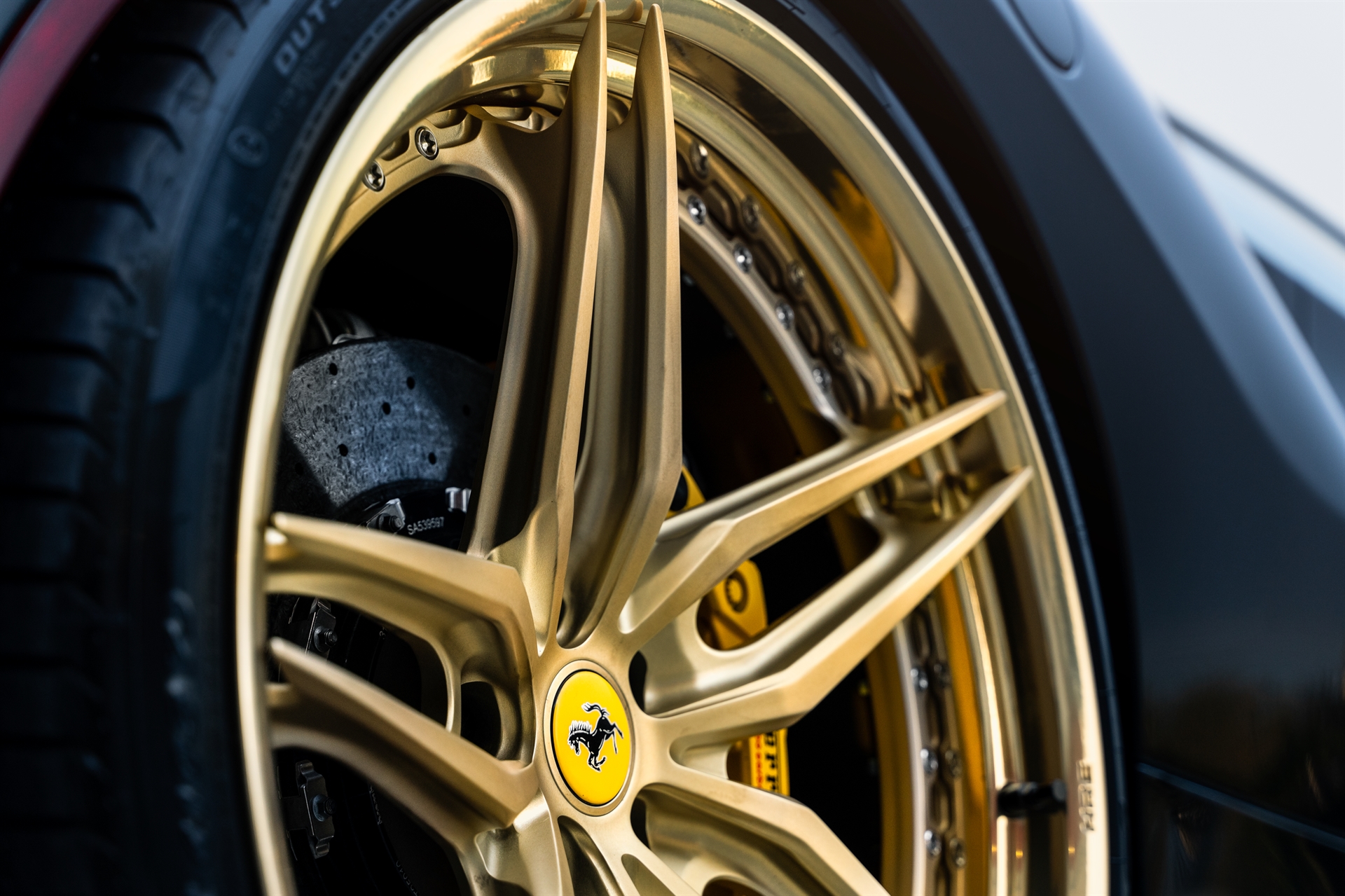 Ferrari F8 | Nero | on HRE P107SC | Frozen Polished Gold