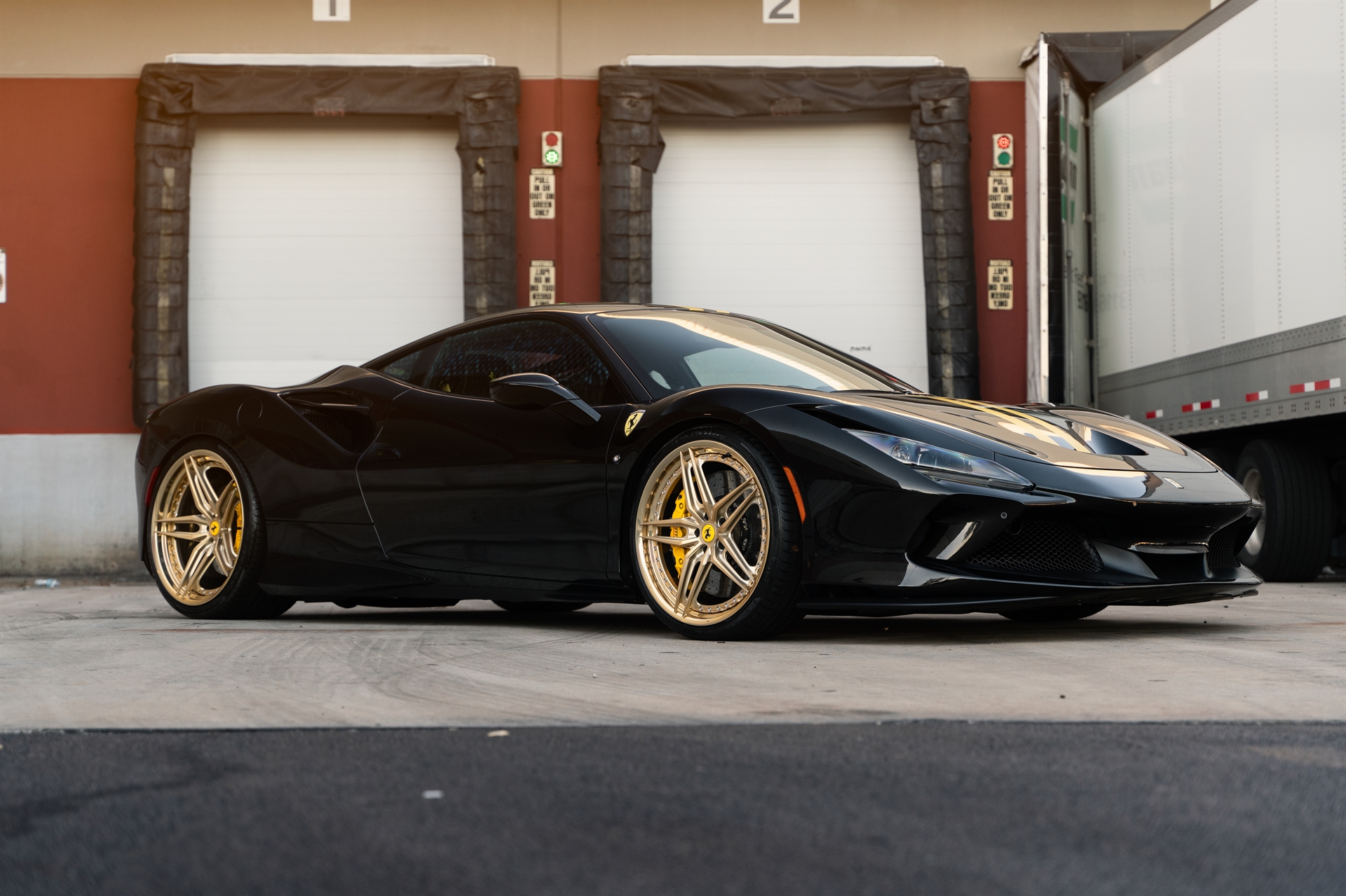 Ferrari F8 | Nero | on HRE P107SC | Frozen Polished Gold