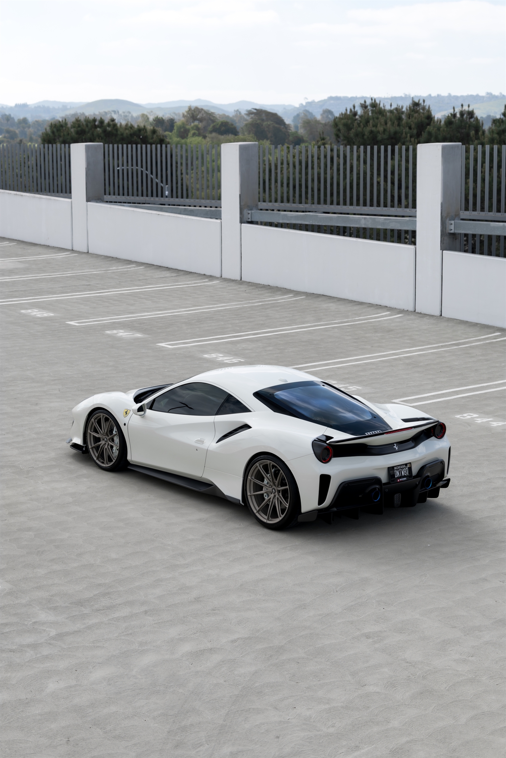 Novitec 488 Pista | Bianco Avus | on HRE P104SC | Satin White Gold