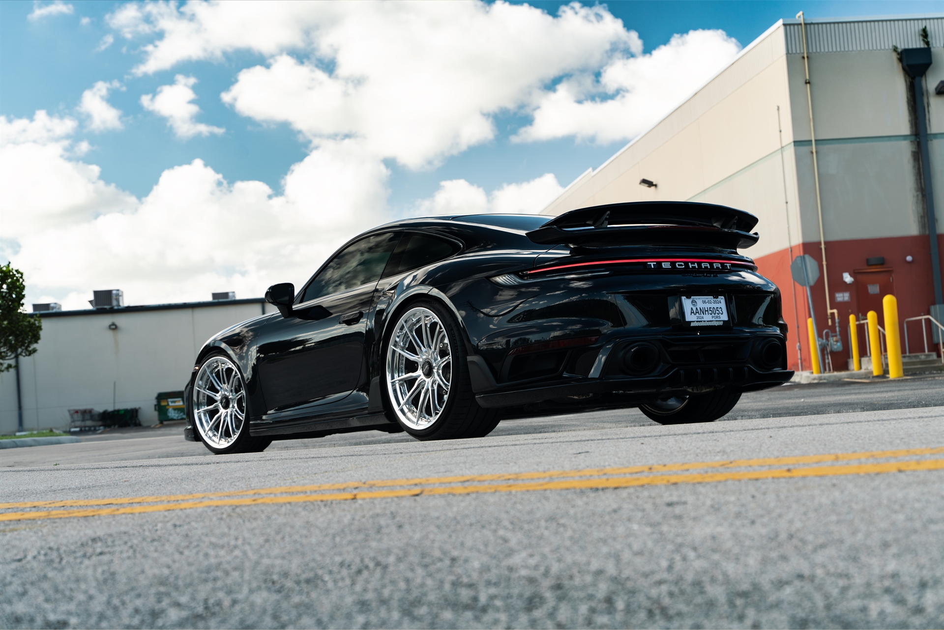 Porsche 992 Turbo S | Jet Black Metallic | on HRE S104SC | Polished Clear | Techart Aero Kit