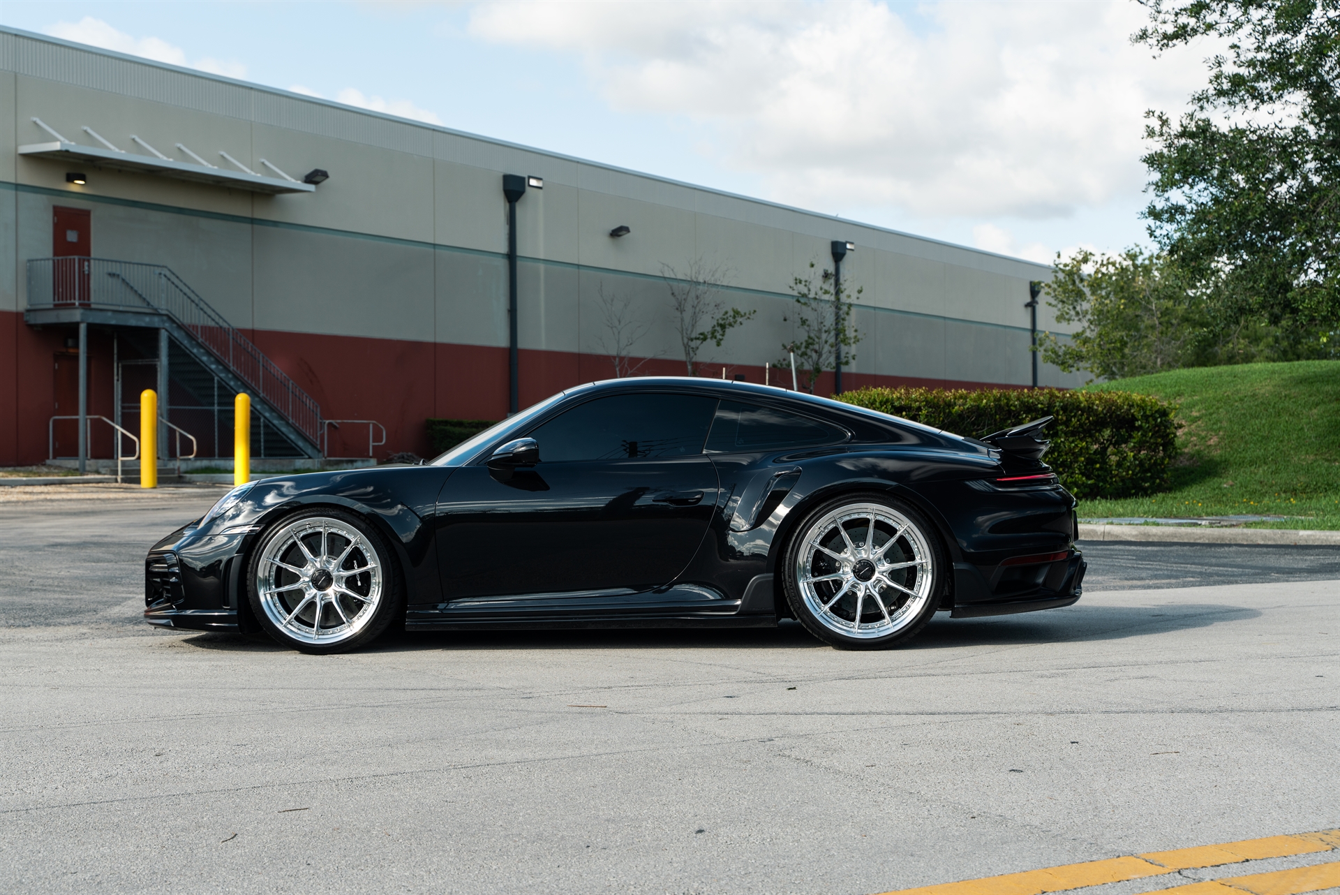 Porsche 992 Turbo S | Jet Black Metallic | on HRE S104SC | Polished Clear | Techart Aero Kit