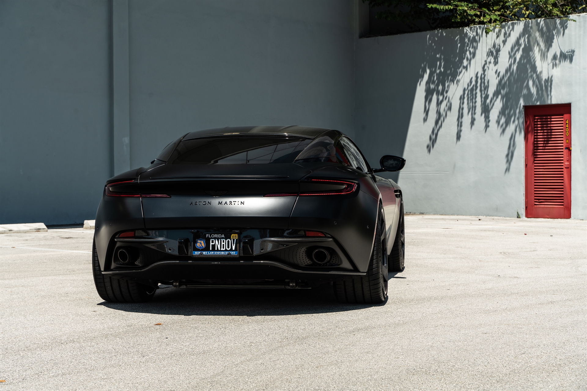 Aston Martin | Satin Jet Black | on ANRKY XR-305 | Satin Mirror Polished Smoke