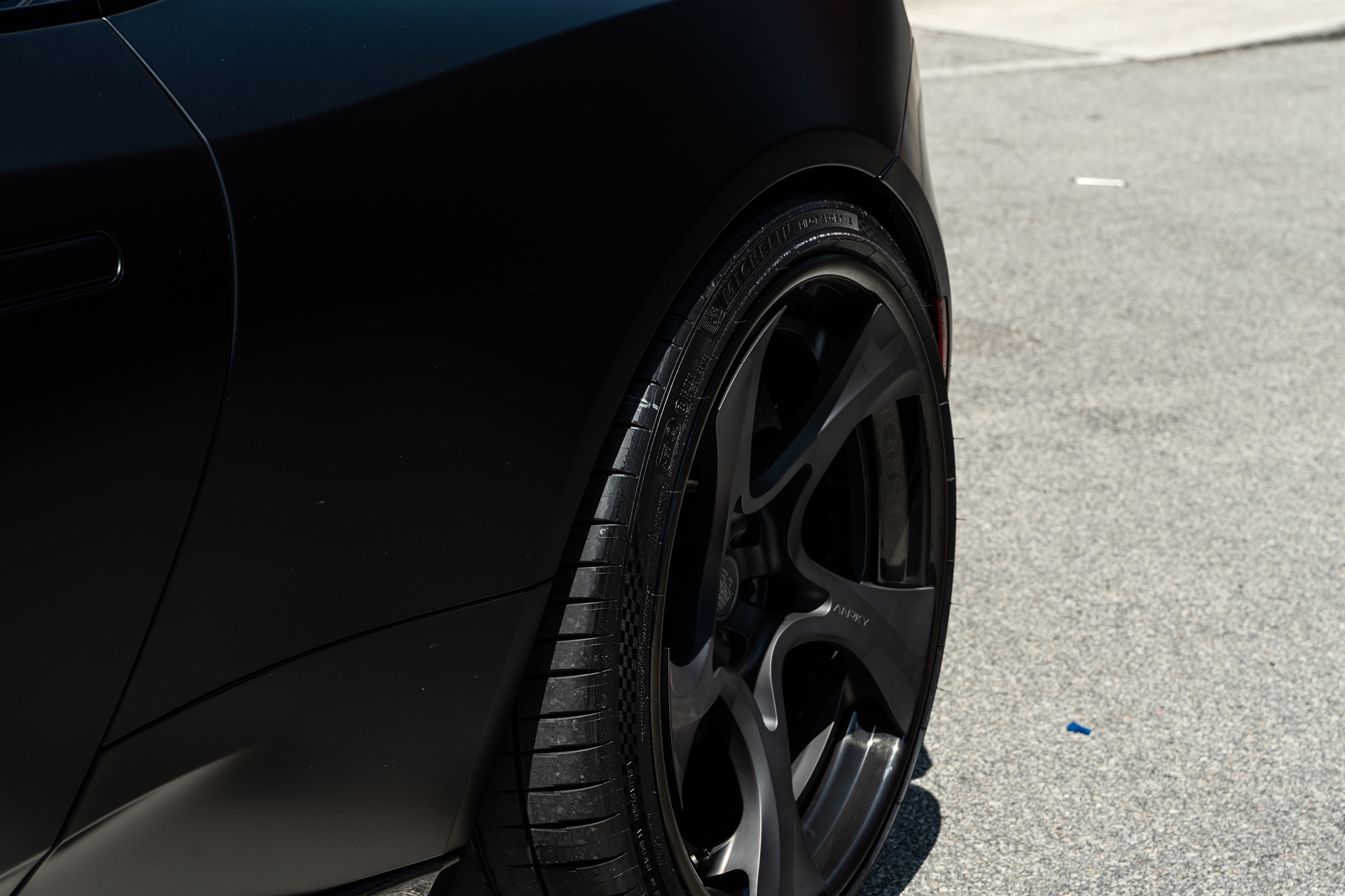 Aston Martin | Satin Jet Black | on ANRKY XR-305 | Satin Mirror Polished Smoke