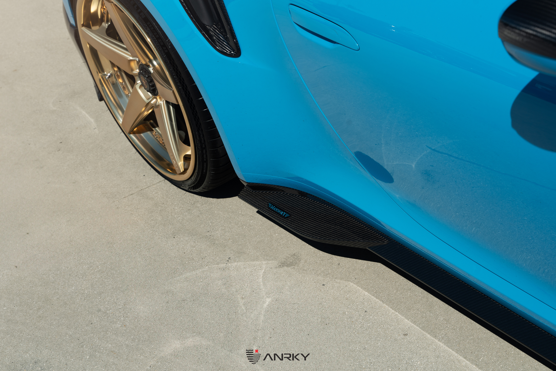 Mansory Porsche 992 | Rivera Blue | on ANRKY RS5.3 | Satin Mirror Polished Gold