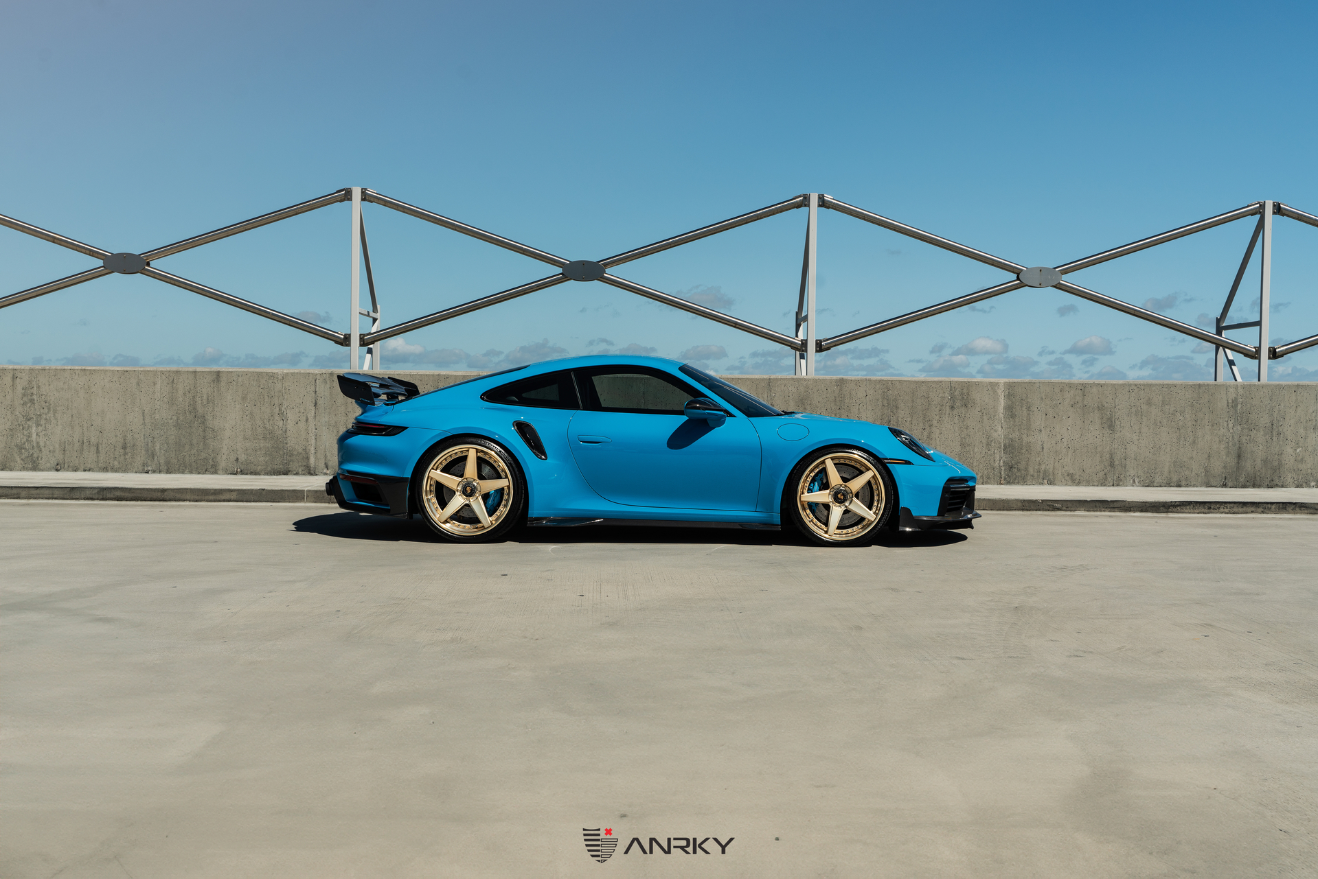 Mansory Porsche 992 | Rivera Blue | on ANRKY RS5.3 | Satin Mirror Polished Gold